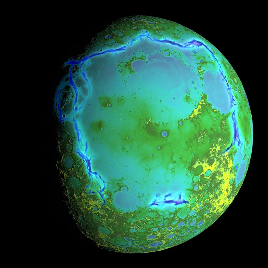 A false-color view of a lunar hemisphere with colors highlighting ancient volcanic rifts.