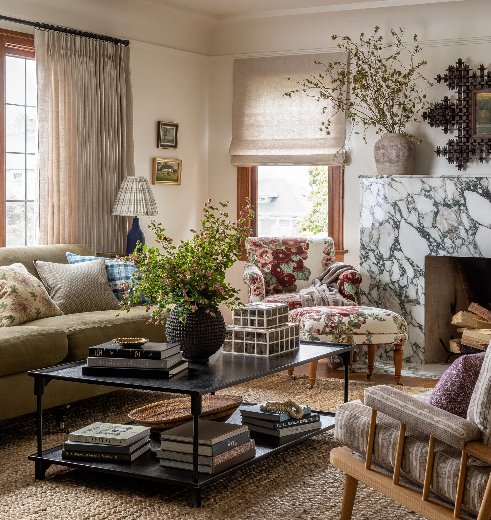 Image may contain Home Decor Coffee Table Furniture Table Lamp Plant Architecture Building Indoors and Living Room