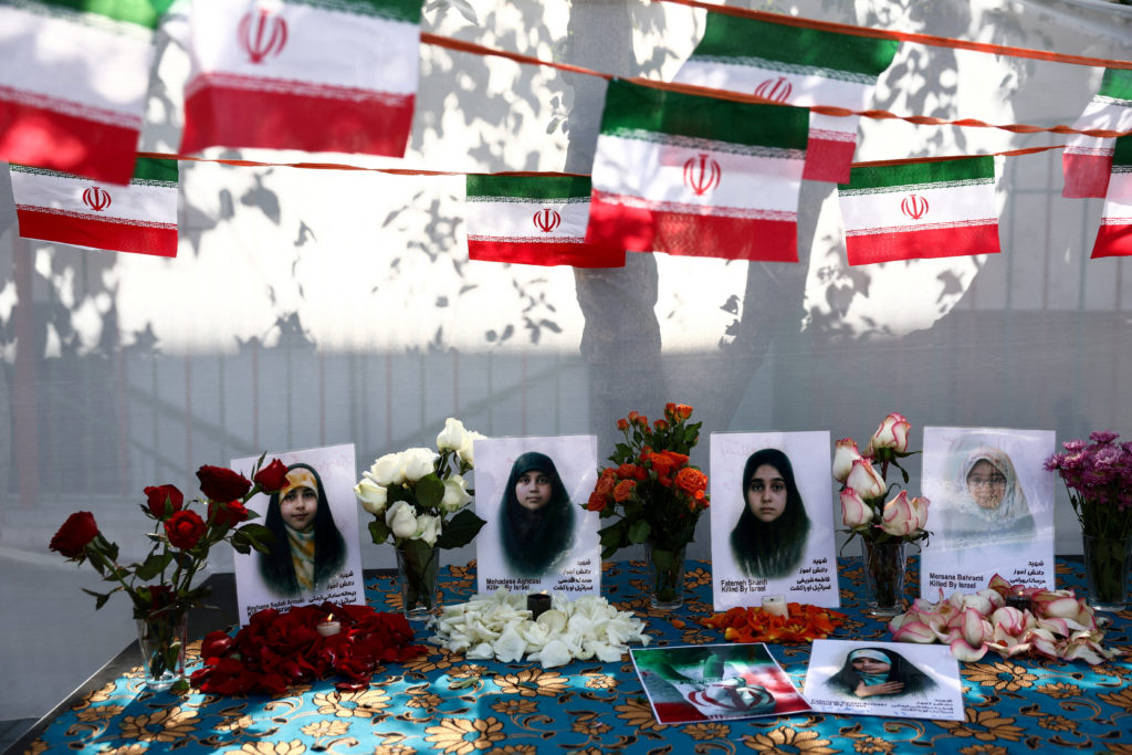 Pictures of the Minab School students who were killed in a strike, are displayed during a ceremony, in Tehran