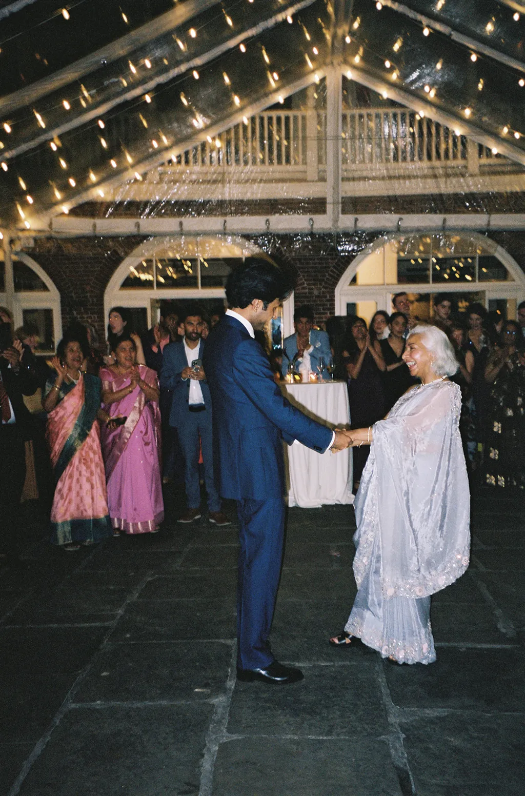 Image may contain Maryam Abacha N. C. Karunya M. S. Sheela Ibrahim ag Alhabib Clothing Formal Wear Suit and Lighting