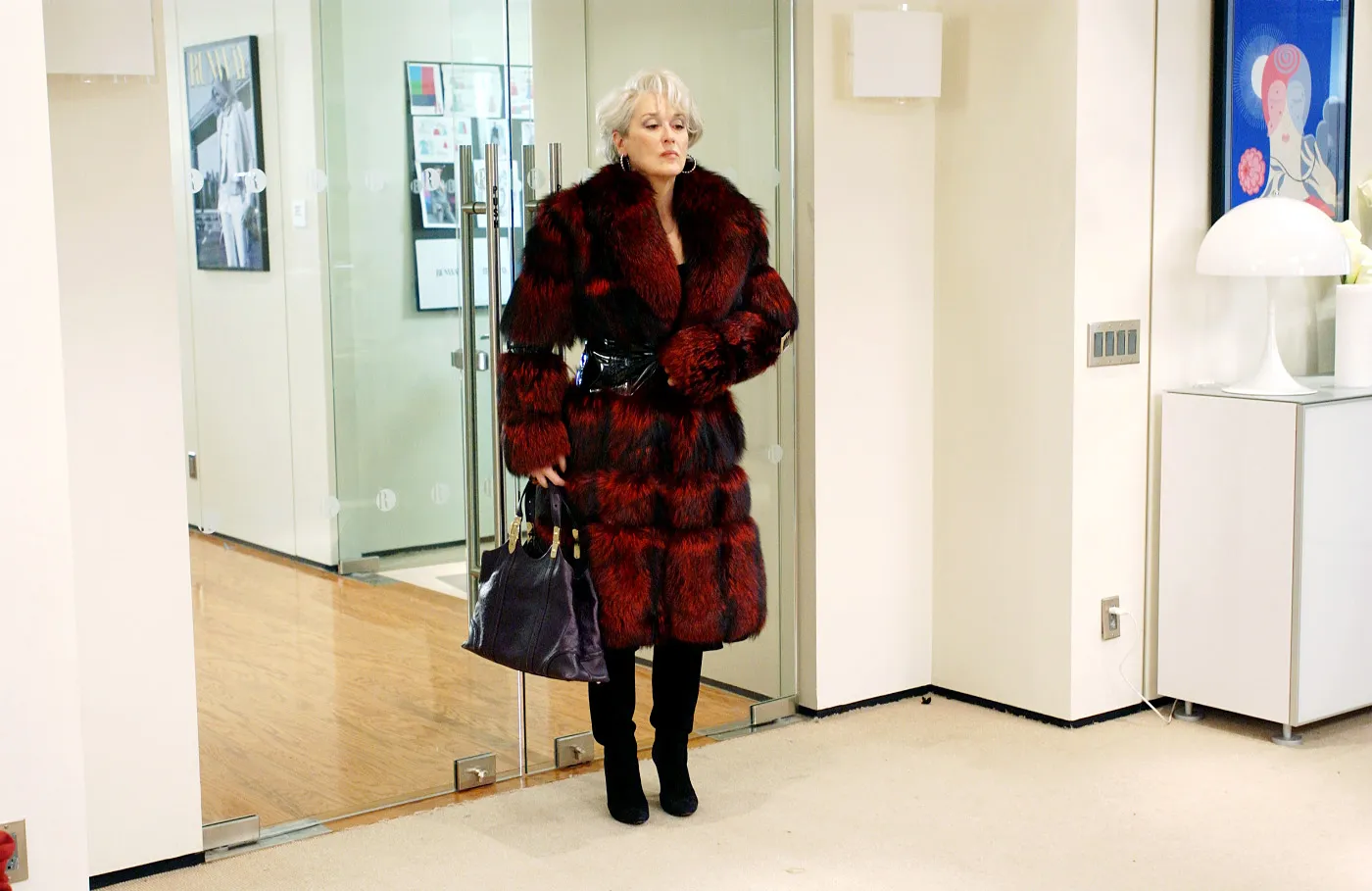Image may contain Meryl Streep Person Adult Clothing Coat Accessories Bag Handbag Face and Head