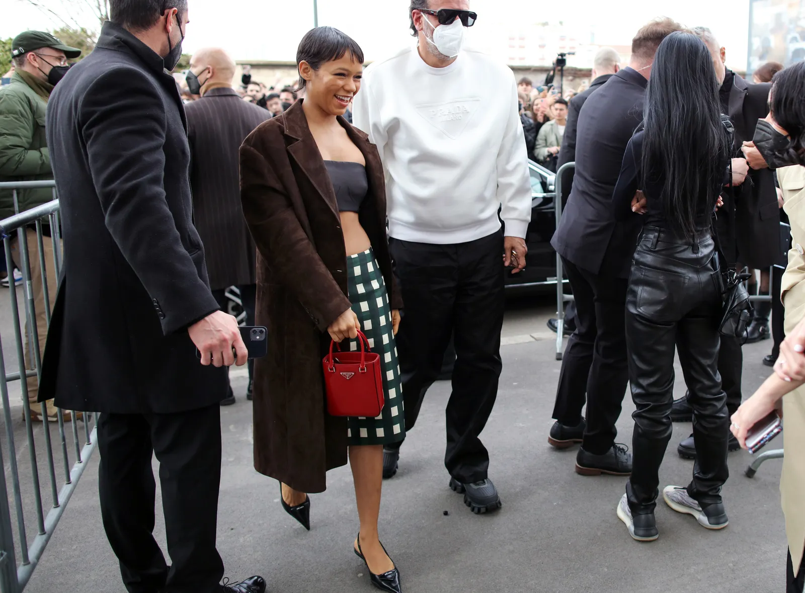 Image may contain Clothing Apparel Shoe Footwear Human Person Sunglasses Accessories Accessory Coat and Overcoat
