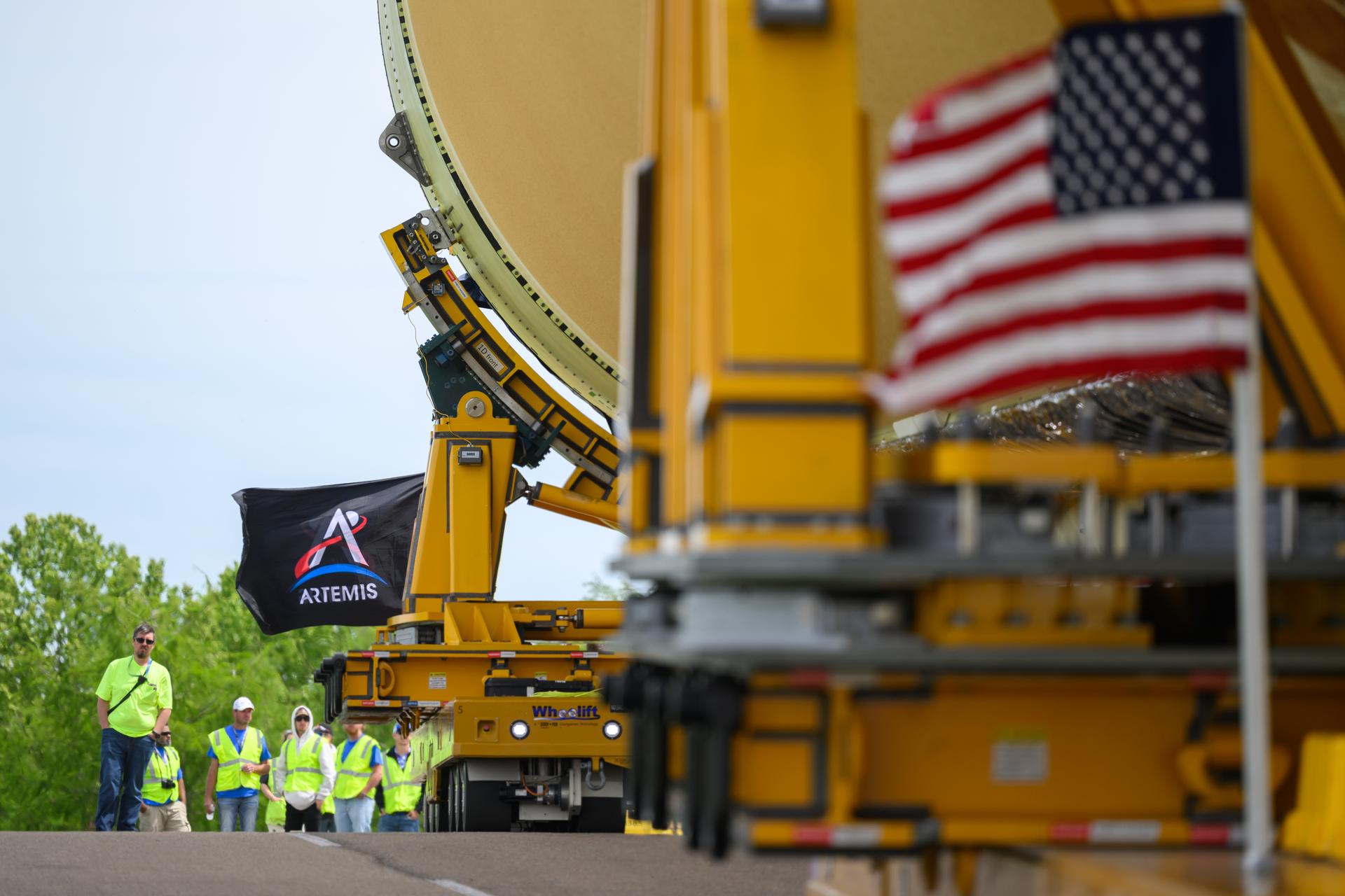 NASA moved the core stage, or the largest section, of the SLS (Space Launch System) rocket that will launch the crewed Artemis III mission in 2027 from the agency’s Michoud Assembly Facility to the agency’s Pegasus barge in New Orleans on April 20. The barge will ferry the top four-fifths – the section containing the liquid hydrogen tank, liquid oxygen tank, intertank, and forward skirt – of the SLS core stage to NASA’s Kennedy Space Center in Florida to complete outfitting and vertical integration.  Teams with NASA and Boeing, the SLS core stage lead contractor, used specialized transporters to guide the top four-fifths from the NASA rocket factory to Pegasus. Prior to the move, technicians added an engine section transportation simulator to the rocket stage for shipment to the Space Coast.  Next year’s Artemis III mission will launch astronauts to Earth’s orbit aboard the Orion spacecraft on top of SLS to test rendezvous and docking capabilities between Orion and commercial spacecraft needed to land Artemis IV astronauts on the Moon in 2028. NASA’s SLS is the only rocket capable of sending Orion, astronauts, and supplies to the Moon in a single launch.   Photo Credit: NASA/Eric Bordelon