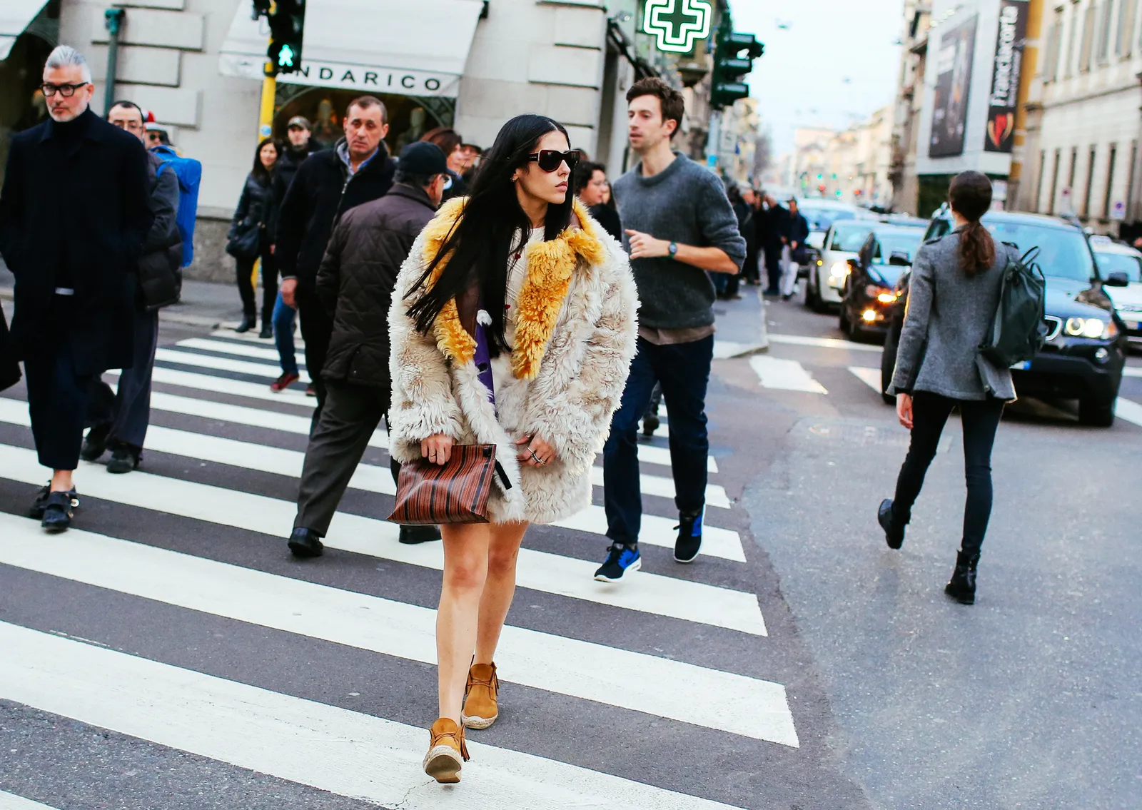 Image may contain Asphalt Tarmac Road Human Pedestrian Person Clothing Shoe Footwear Apparel and Zebra Crossing
