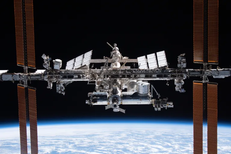 The International Space Station is pictured from the SpaceX Crew Dragon Endeavour during a fly around of the orbiting lab that took place following its undocking from the Harmony module’s space-facing port on Nov. 8, 2021. The orbital complex was flying 263 miles above the Marshall Islands in the Pacific Ocean when this photograph was taken. Credit: NASA