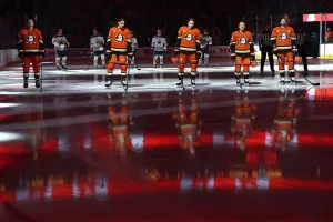 ANAHEIM, CALIFORNIA - APRIL 26: Drew Helleson #14 , Beckett Sennecke #45, Pavel Mintyukov #98, Mikael Granlund #64 of the Anaheim Ducks and #17 of the Anaheim Ducks look on during the national anthem prior to Game Three of the First Round of the 2026 Stanley Cup Playoffs against the Edmonton Oilers at Honda Center on April 26, 2026 in Anaheim, California. (Photo by Sean M. Haffey/Getty Images)