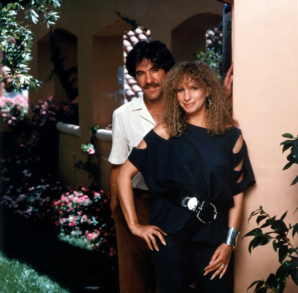 Image may contain Geraldo Rivera Barbra Streisand Adult Person Curly Hair Hair Accessories Bracelet and Jewelry