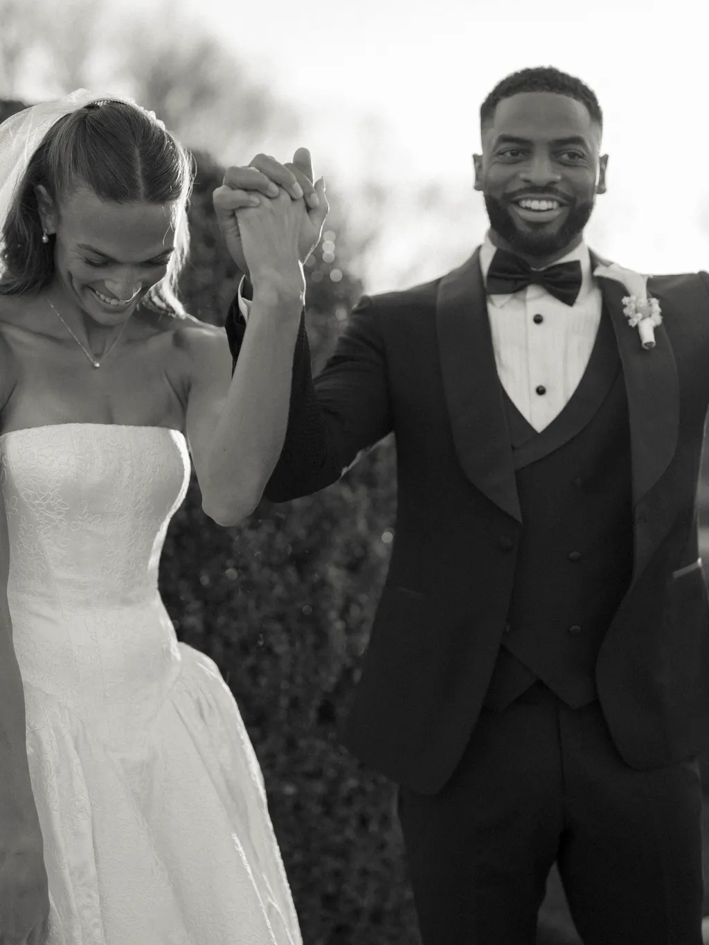 Image may contain Clothing Formal Wear Suit Tuxedo Dress Fashion Gown Face Head Person Photography and Portrait