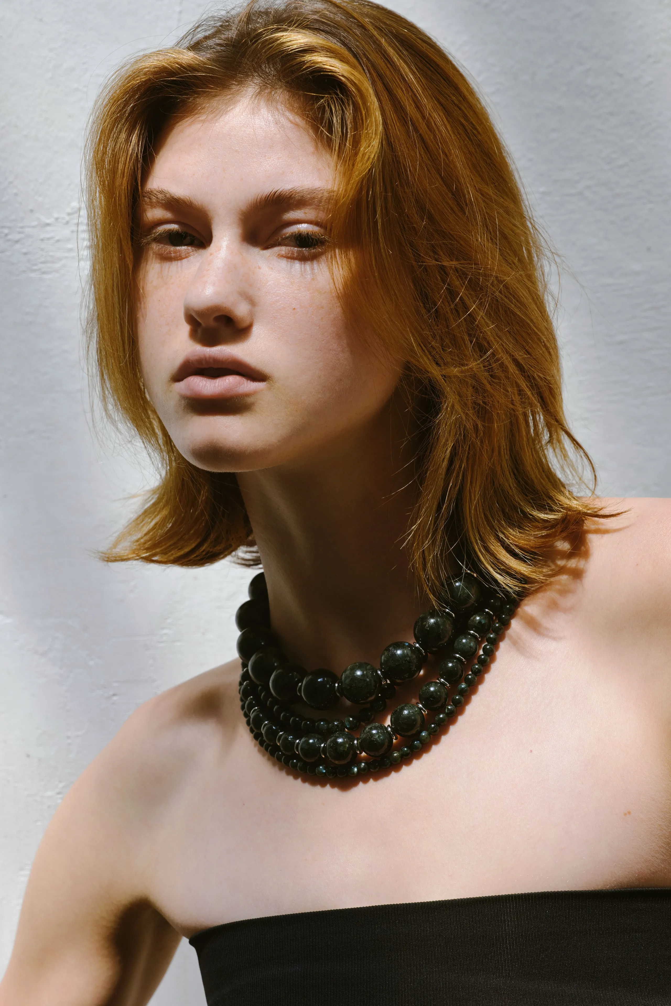 Image may contain Accessories Jewelry Necklace Body Part Face Head Neck Person Adult Photography and Portrait