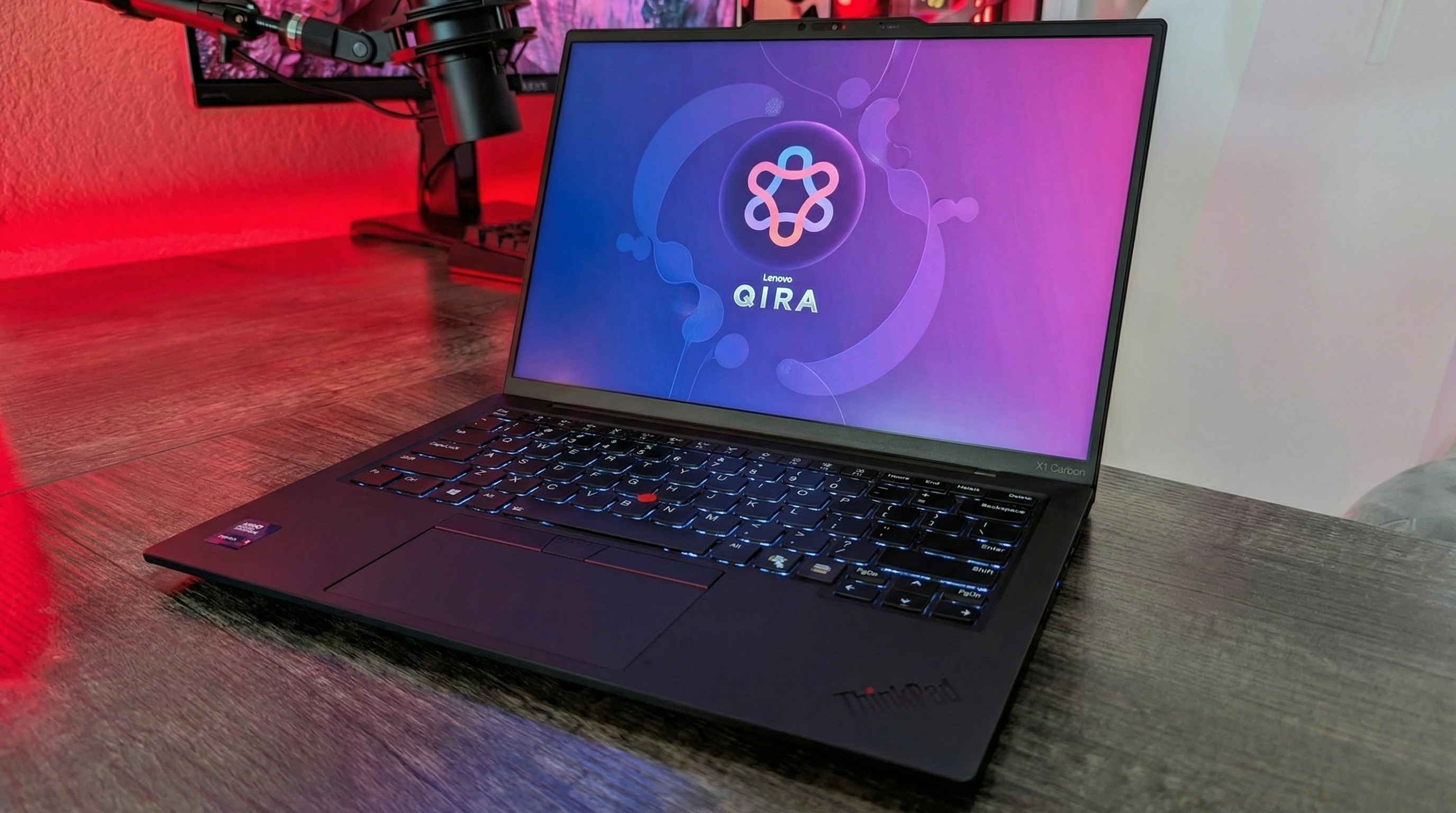 ThinkPad X1 Carbon with Lenovo Qira logo onscreen