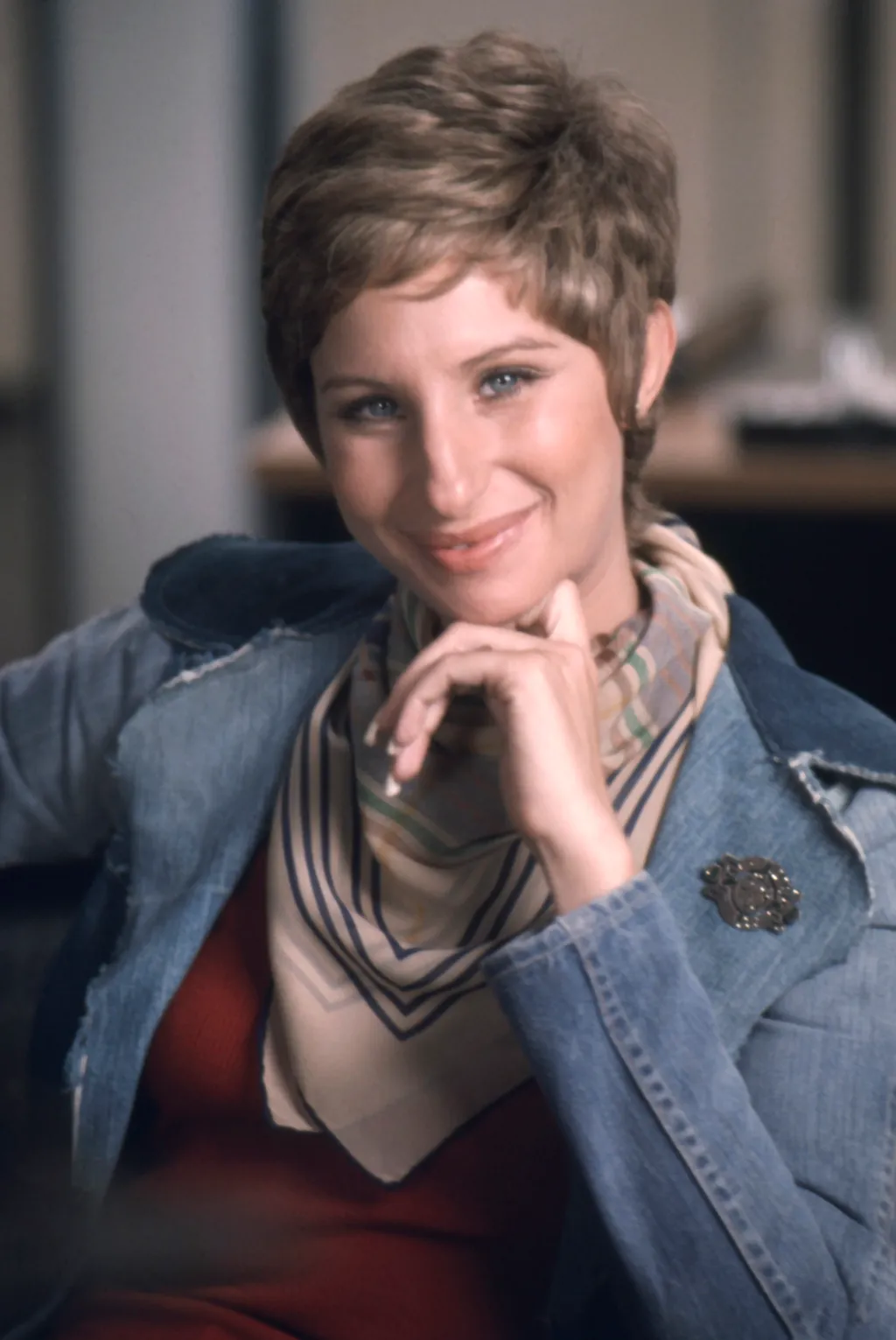 Image may contain Barbra Streisand Clothing Coat Jacket Blazer Pants Face Head Person Photography and Portrait