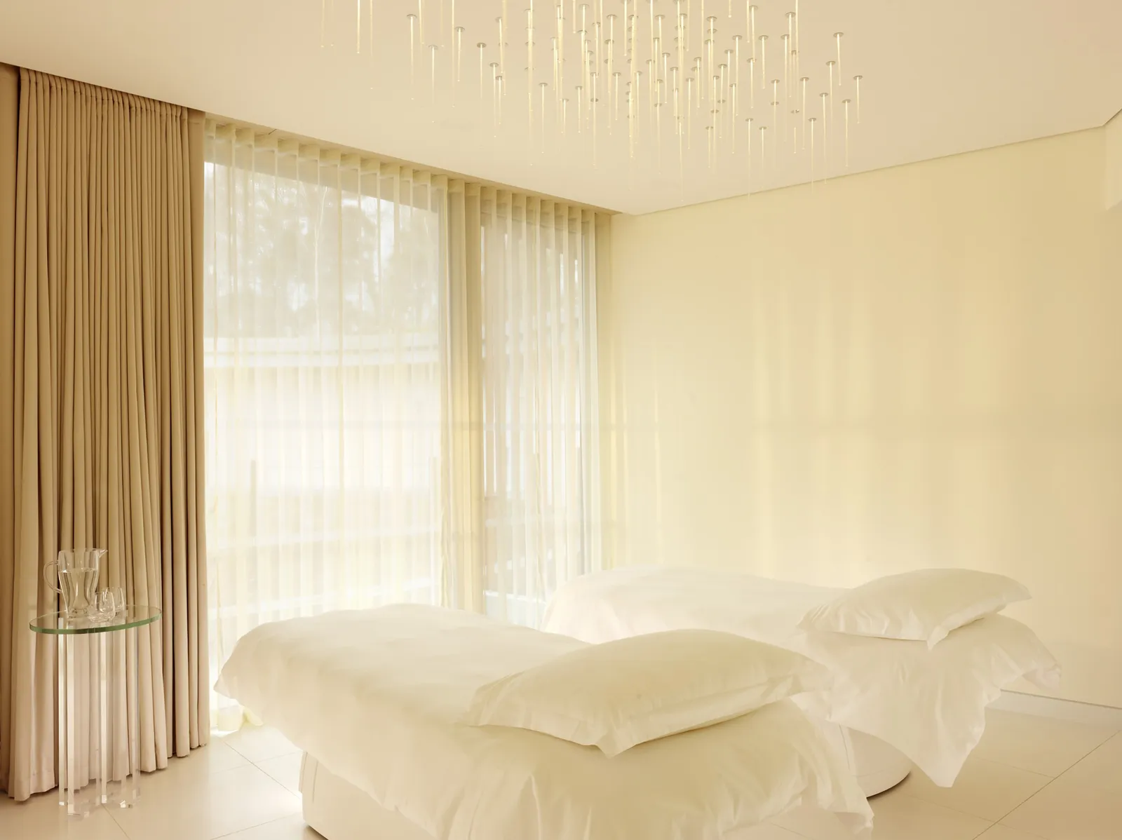 Image may contain Home Decor Indoors Interior Design Cushion Bed Furniture and Pillow