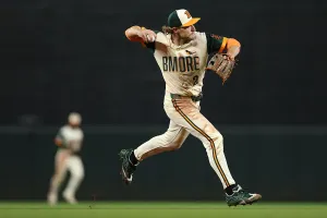 BALTIMORE, MARYLAND - APRIL 24: Gunnar Henderson #2 of the Baltimore Orioles fields a hit against the Boston Red Sox during the sixth inning at Oriole Park at Camden Yards on April 24, 2026 in Baltimore, Maryland. (Photo by Patrick Smith/Getty Images)