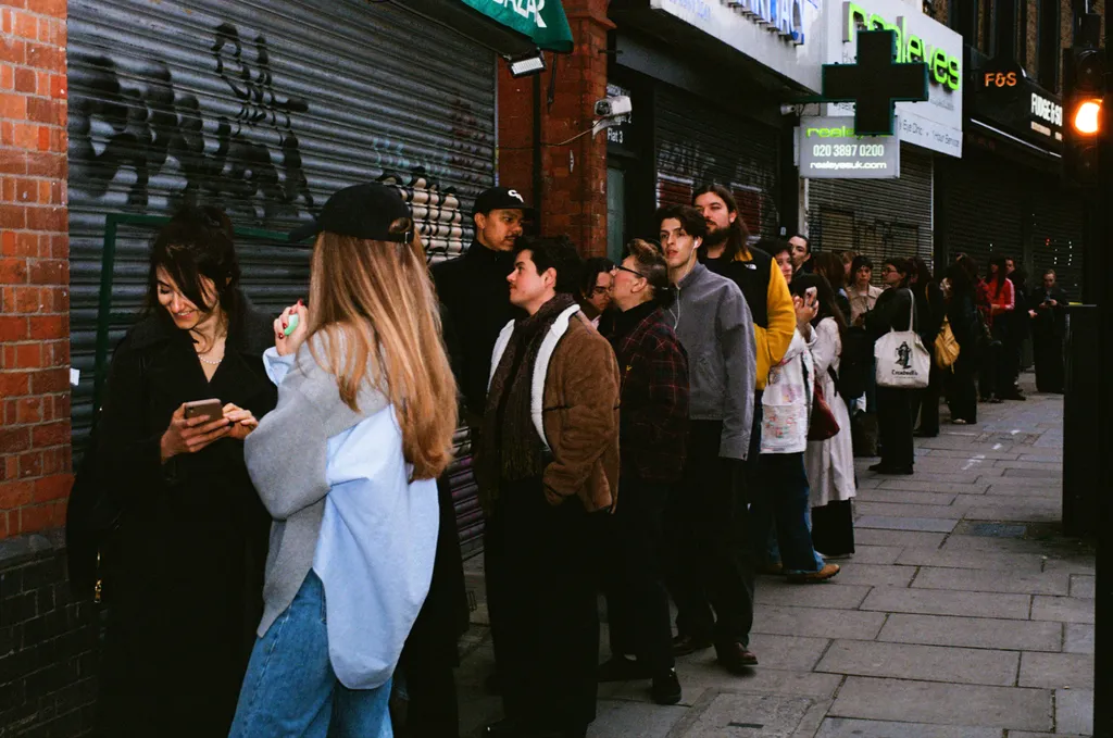 Image may contain Colin Powell Foued Kadir Clothing Coat Jacket City Road Street Urban Pants People and Person