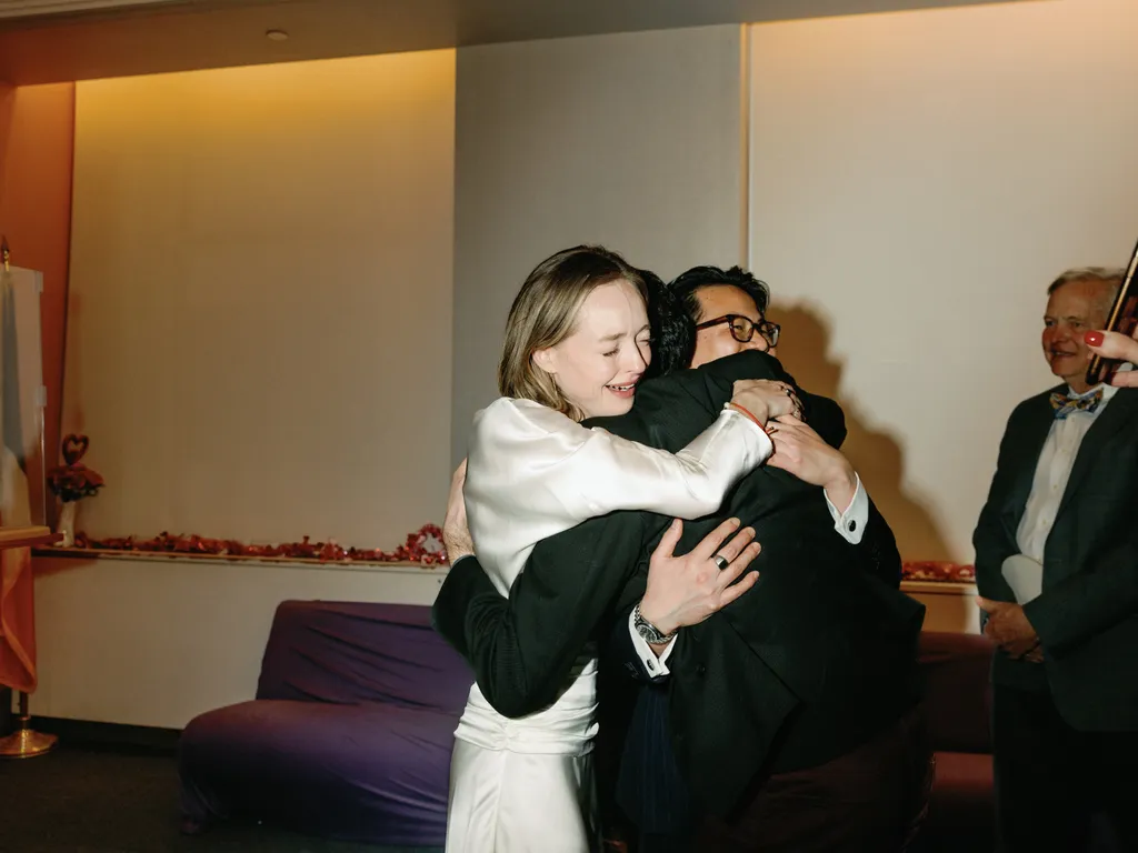 Image may contain Stella Donnelly Blazer Clothing Coat Jacket People Person Formal Wear Suit Hugging and Face
