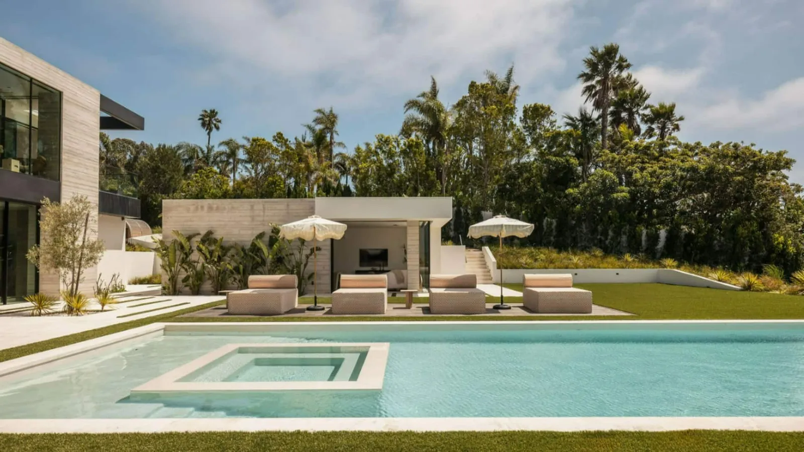 Image may contain Architecture Building House Housing Villa Pool Water Swimming Pool and Computer Hardware