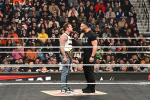 PHILADELPHIA, PENNSYLVANIA - FEBRUARY 2: CM Punk and Roman Reigns face off during Monday Night RAW at Xfinity Mobile Arena on February 2, 2026 in Philadelphia, United States. (Photo by Mike Marques/WWE via Getty Images)