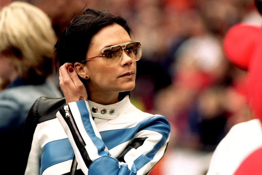 Image may contain Victoria Beckham Accessories Sunglasses People Person Glasses Head Face Frown and Sad. Victoria...