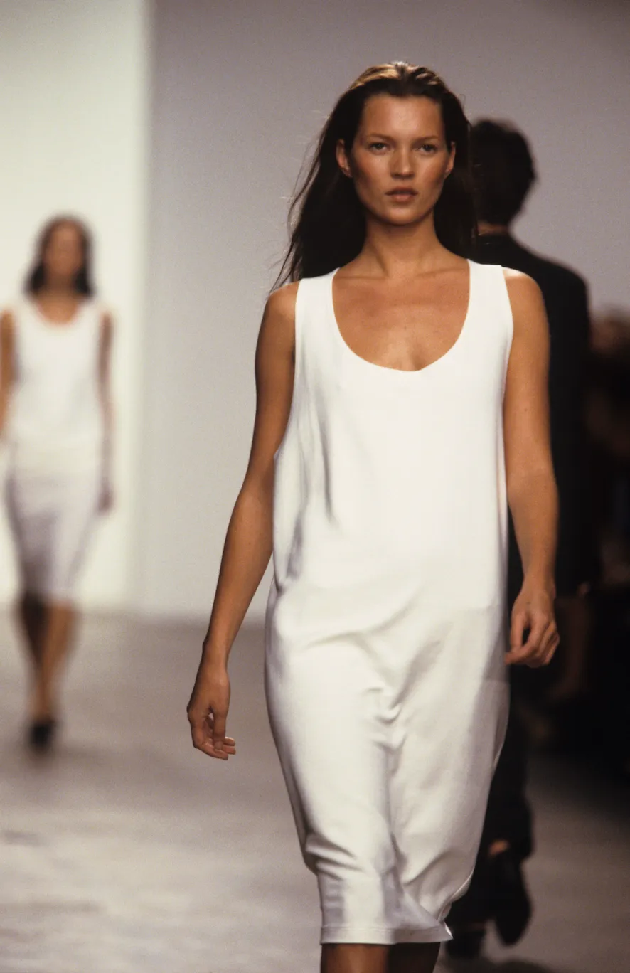 Image may contain Kate Moss Fashion Adult Person Clothing Dress Face and Head