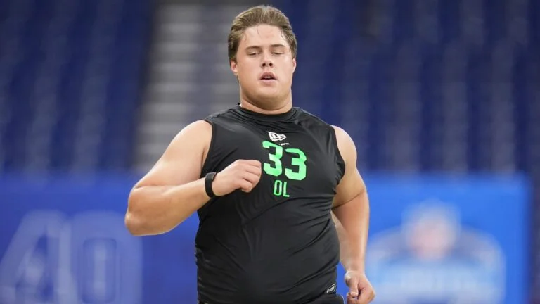 Caleb Lomu Patriots phone call draft night