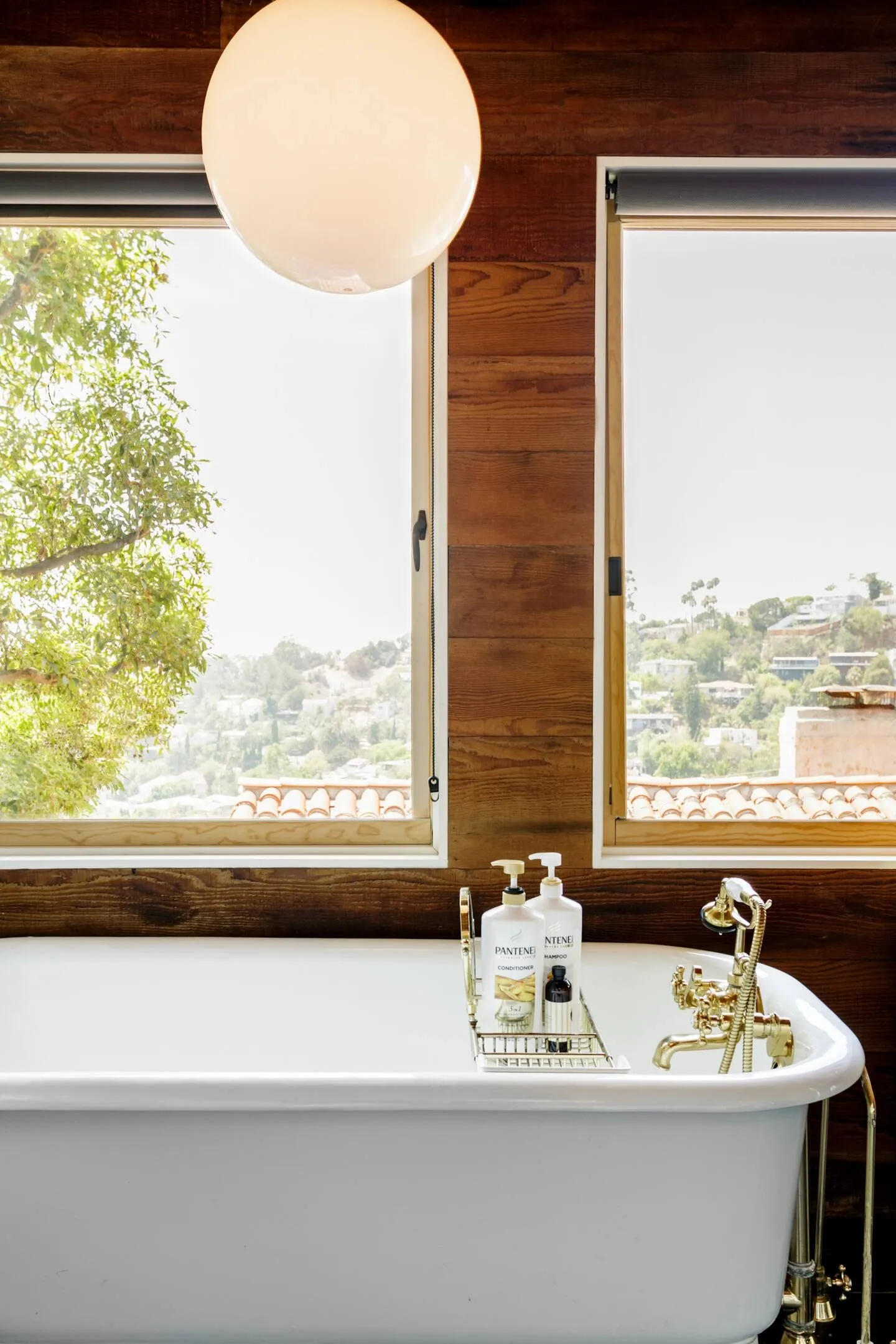 Image may contain Bathing Bathtub Person Tub Indoors Interior Design Window and Windowsill