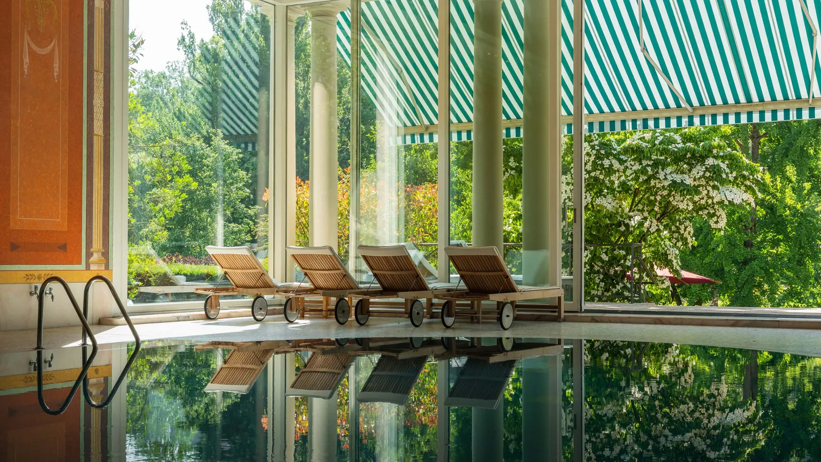 Image may contain Chair Furniture Pool Water Indoors and Interior Design