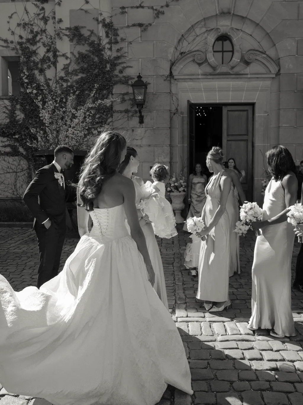 Image may contain Clothing Dress Fashion Formal Wear Gown Wedding Wedding Gown Adult Person and Flower