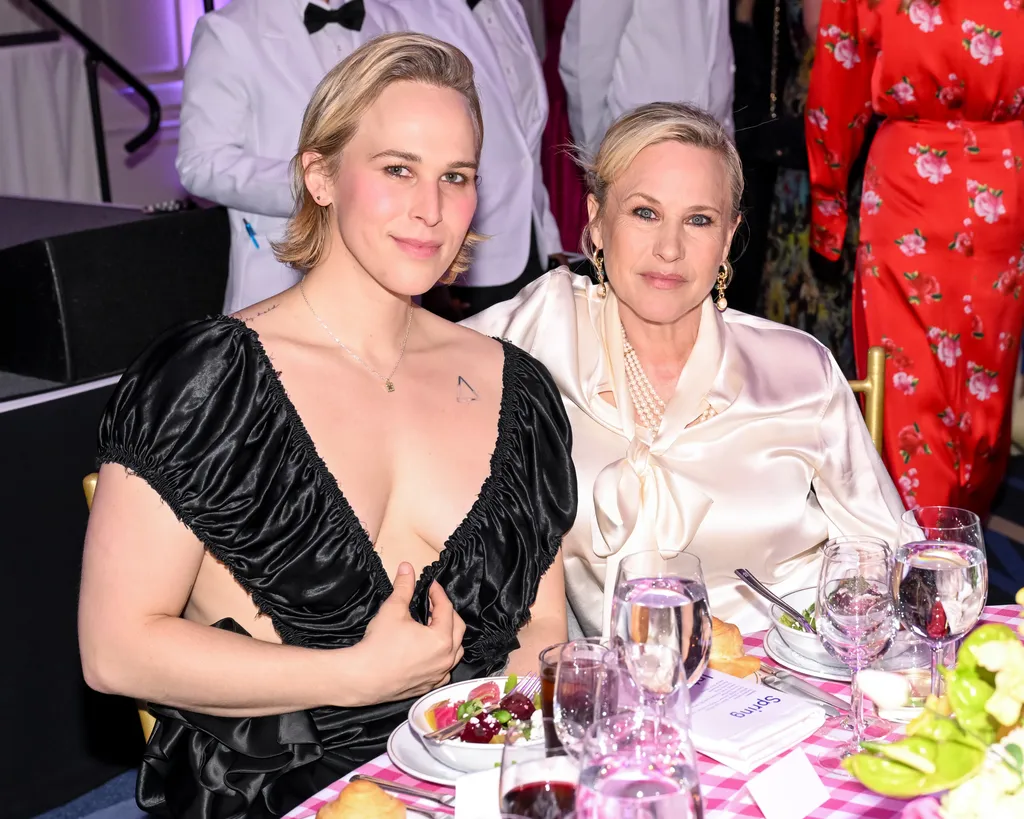 Image may contain Patricia Arquette Person Adult Bread Food Photobombing Accessories Formal Wear Tie and Wedding