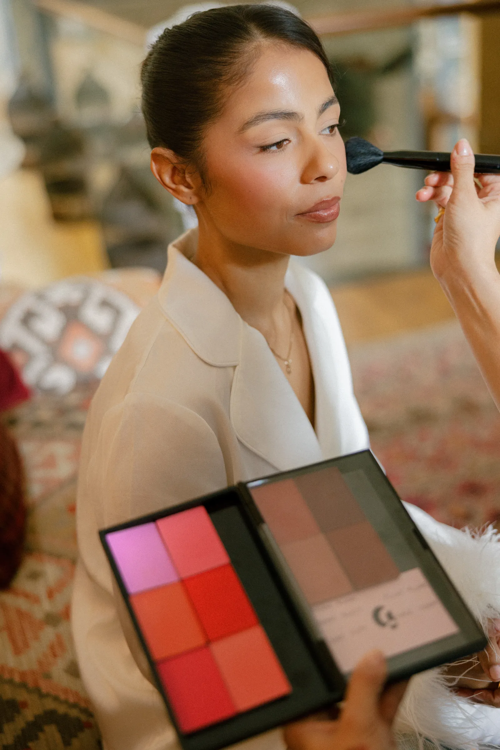 Image may contain Cosmetics Adult Person Makeup Brush Device Tool Computer Electronics and Tablet Computer