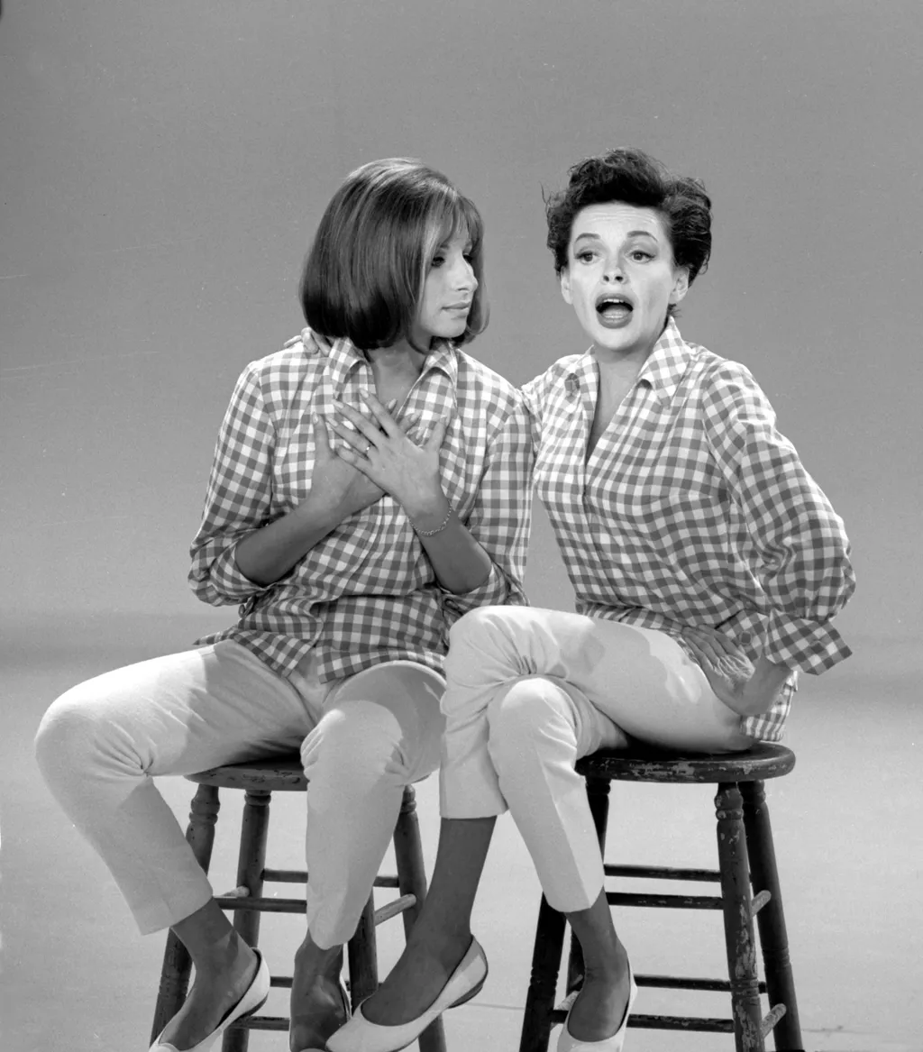 Image may contain Furniture Barbra Streisand Human Person Chair Judy Garland Clothing Apparel Bar Stool and Sitting