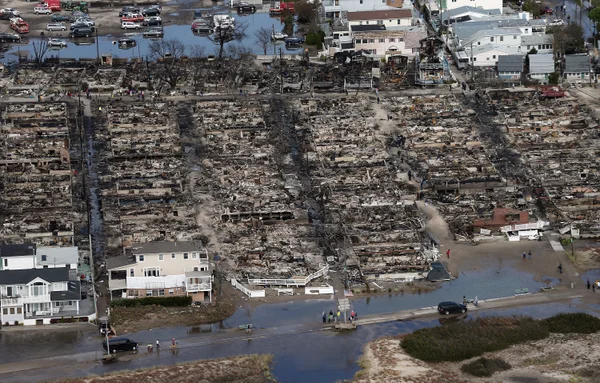 Aerial view of flooding and destroyed homes.
