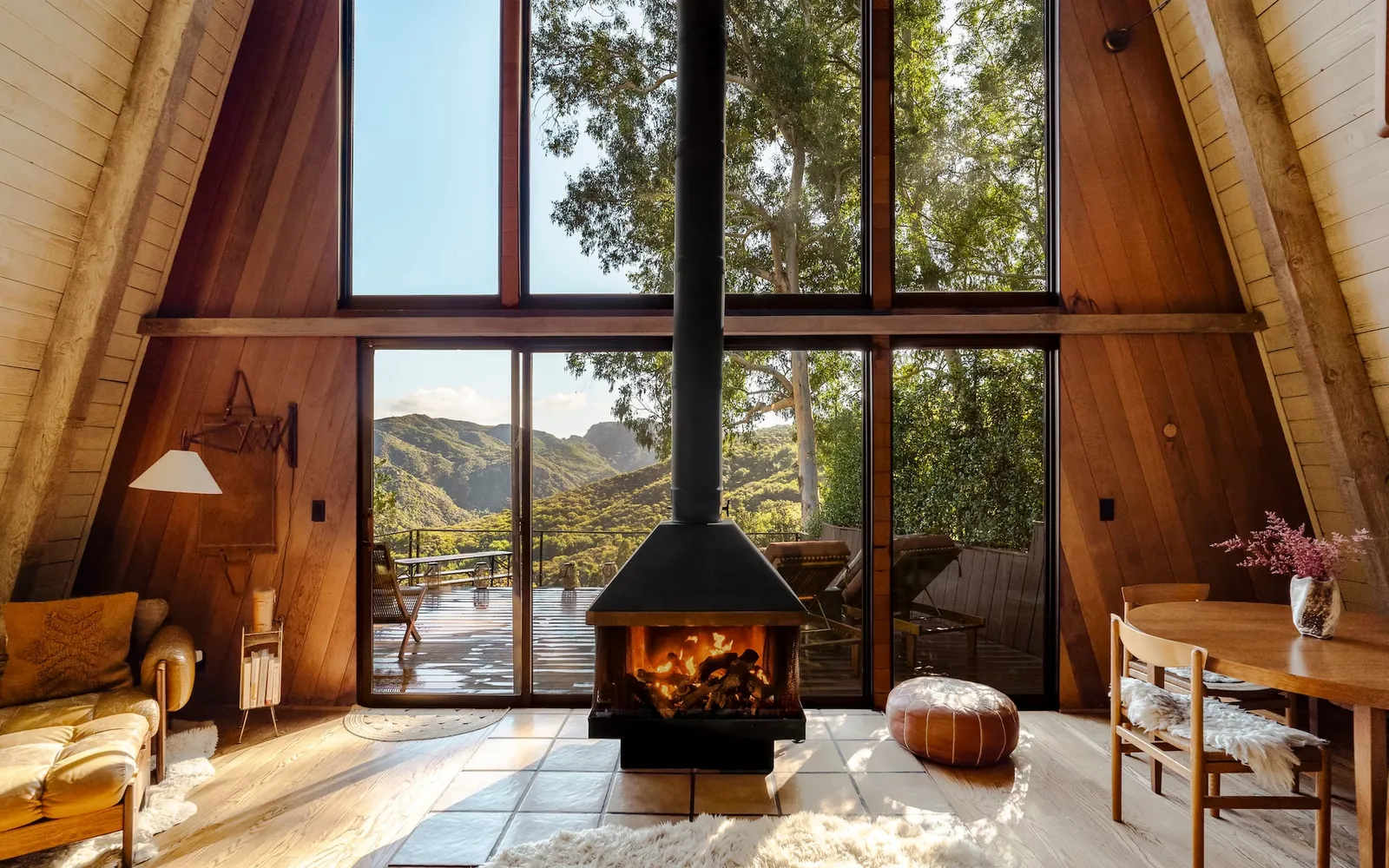 Image may contain Fireplace Indoors Hearth Interior Design Home Decor and Rug