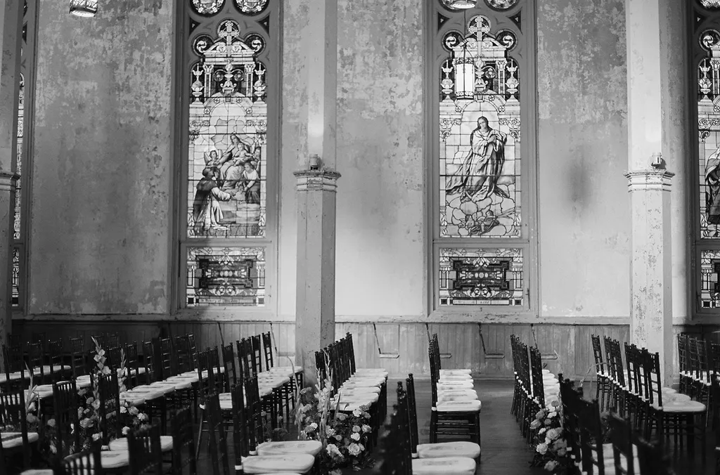 Image may contain Sir John Tenniel Art Adult Person Indoors Altar Architecture Building Church Prayer and Baby