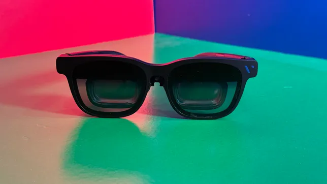 Viture Beast display glasses on a multicolored table