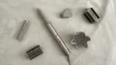 the shark flexstyle and its attachments laid out on a white blanket