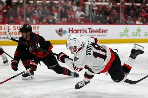 RALEIGH, NORTH CAROLINA - APRIL 20: Tim Stützle #18 of the Ottawa Senators attempts a shot during the third period of Game Two of the First Round of the 2026 Stanley Cup Playoffs against the Carolina Hurricanes at Lenovo Center on April 20, 2026 in Raleigh, North Carolina. (Photo by Jared C. Tilton/Getty Images)