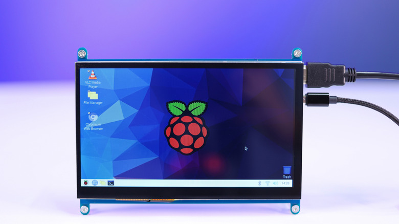 The Raspberry Pi logo on a touchscreen