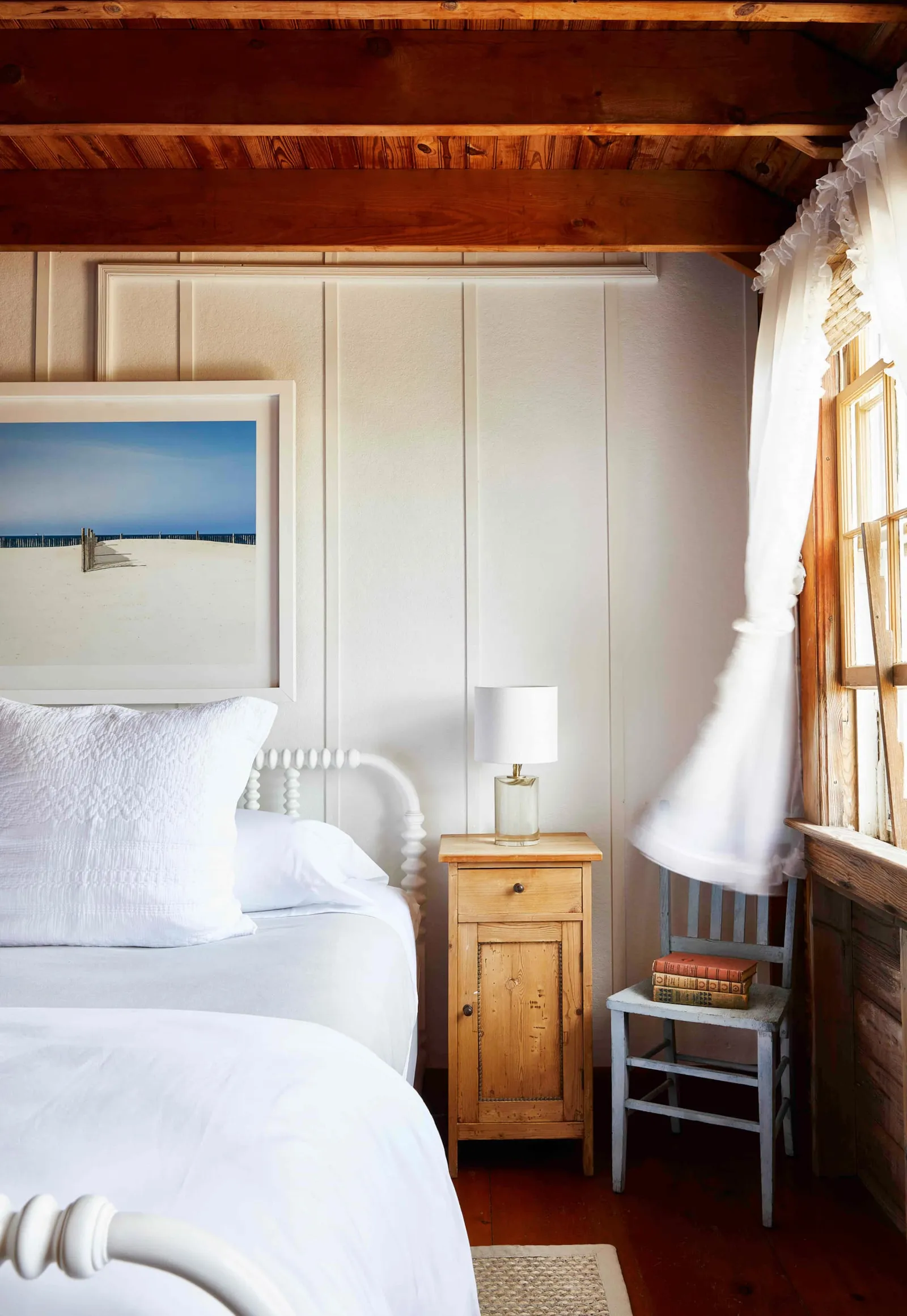 Image may contain Indoors Interior Design Hardwood Stained Wood Wood Furniture Bed Bedroom Room and Wood Panels