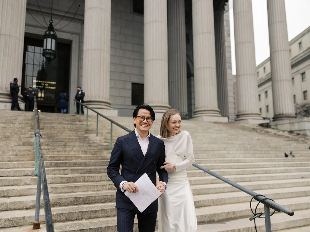 Image may contain Kiren Rijiju Blazer Clothing Coat Jacket Person Architecture Building House and Housing