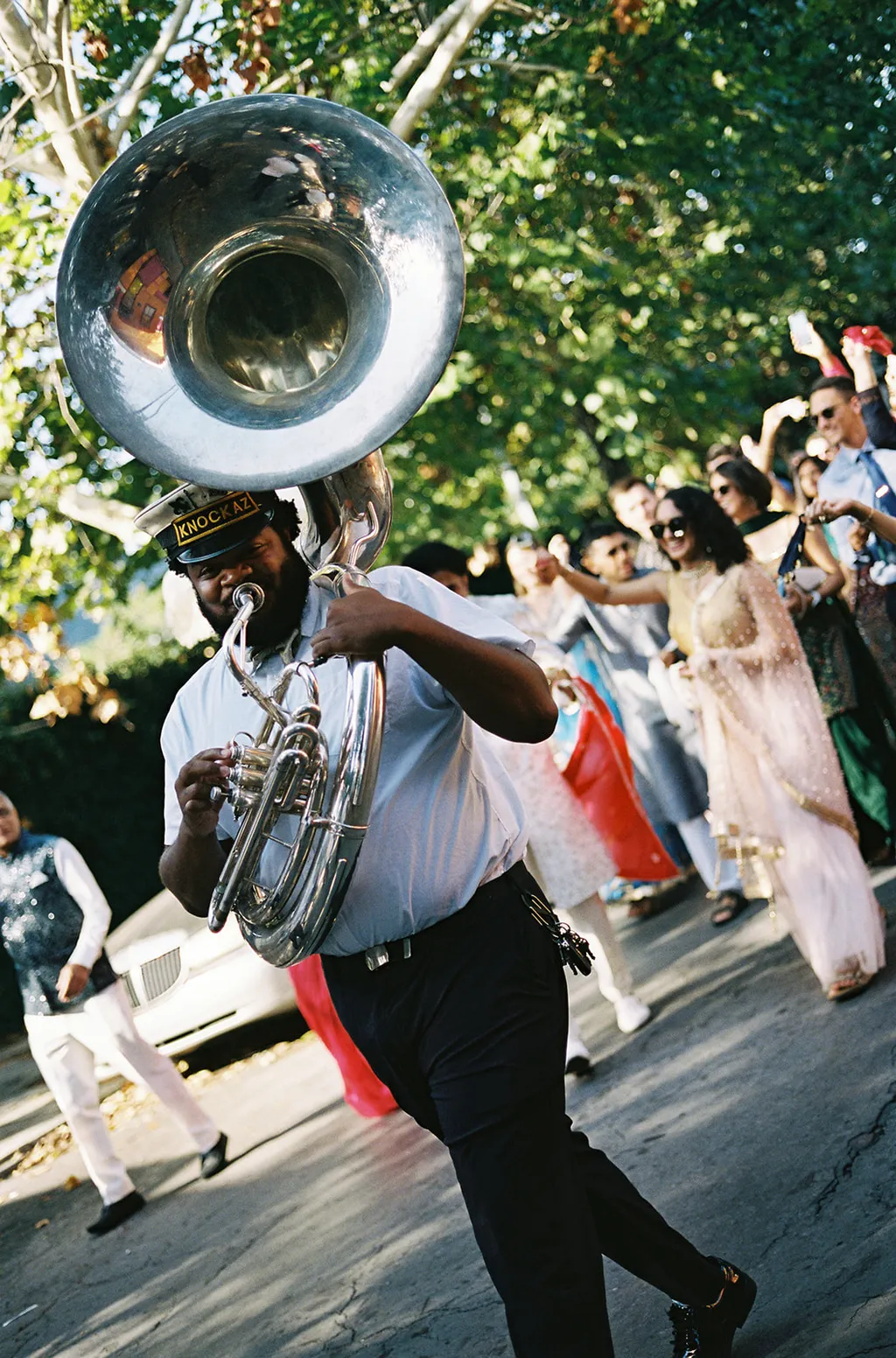 Image may contain Cat Sandion People Person Adult Brass Section Horn Musical Instrument Tuba and Wedding