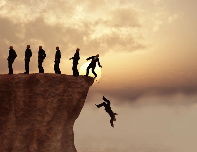 Men on a cliff