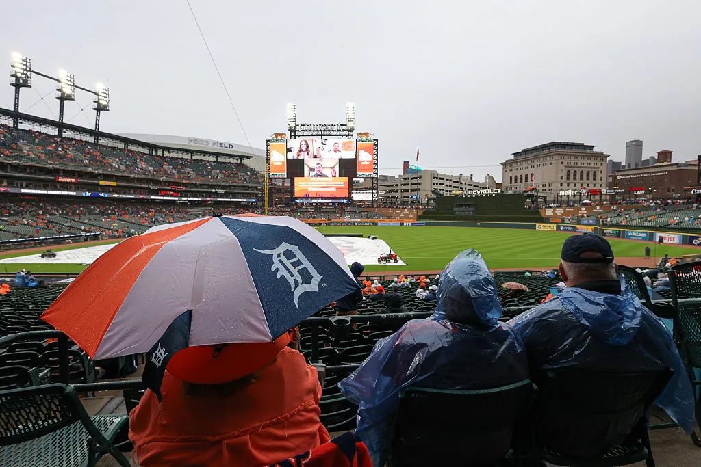 DETROIT, MI - OCTOBER 07: Fan wait in their seats while the tarp remains on the field during a rain delay to the start of the ALDS Game 3 between the Seattle Mariners and the Detroit Tigers on October 7, 2025 at Comerica Park in Detroit, Michigan. (Photo by Scott W. Grau/Icon Sportswire via Getty Images)