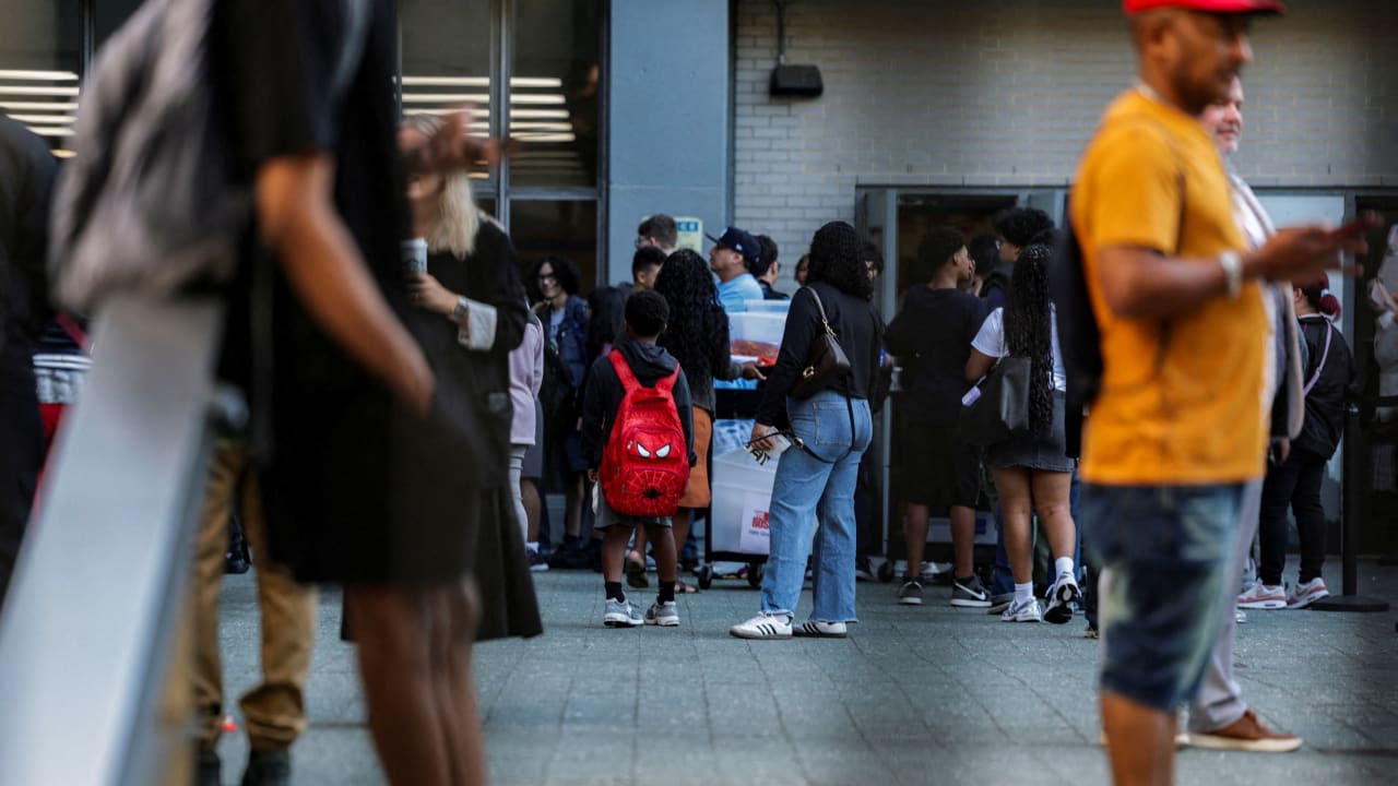 Students wait a line to enter the school on the first day of classes at New York City public schools in Manhattan, US, September 4, 2025. Students wait a line to enter the school on the first day of classes at New York City public schools in Manhattan, US, September 4, 2025.