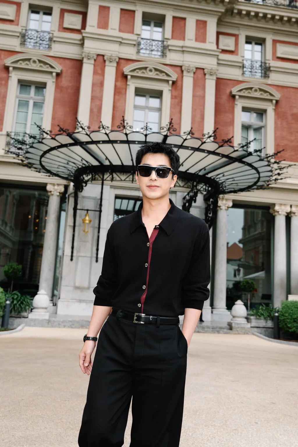 Image may contain Jiro Wang Face Head Person Photography Portrait Blazer Clothing Coat Jacket and Accessories