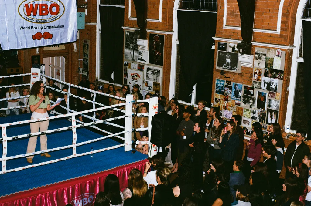 Image may contain Lance Robertson Rachel Weisz Dontrelle Inman Insoo Kim Berg Adult Person Face Head and Boxing