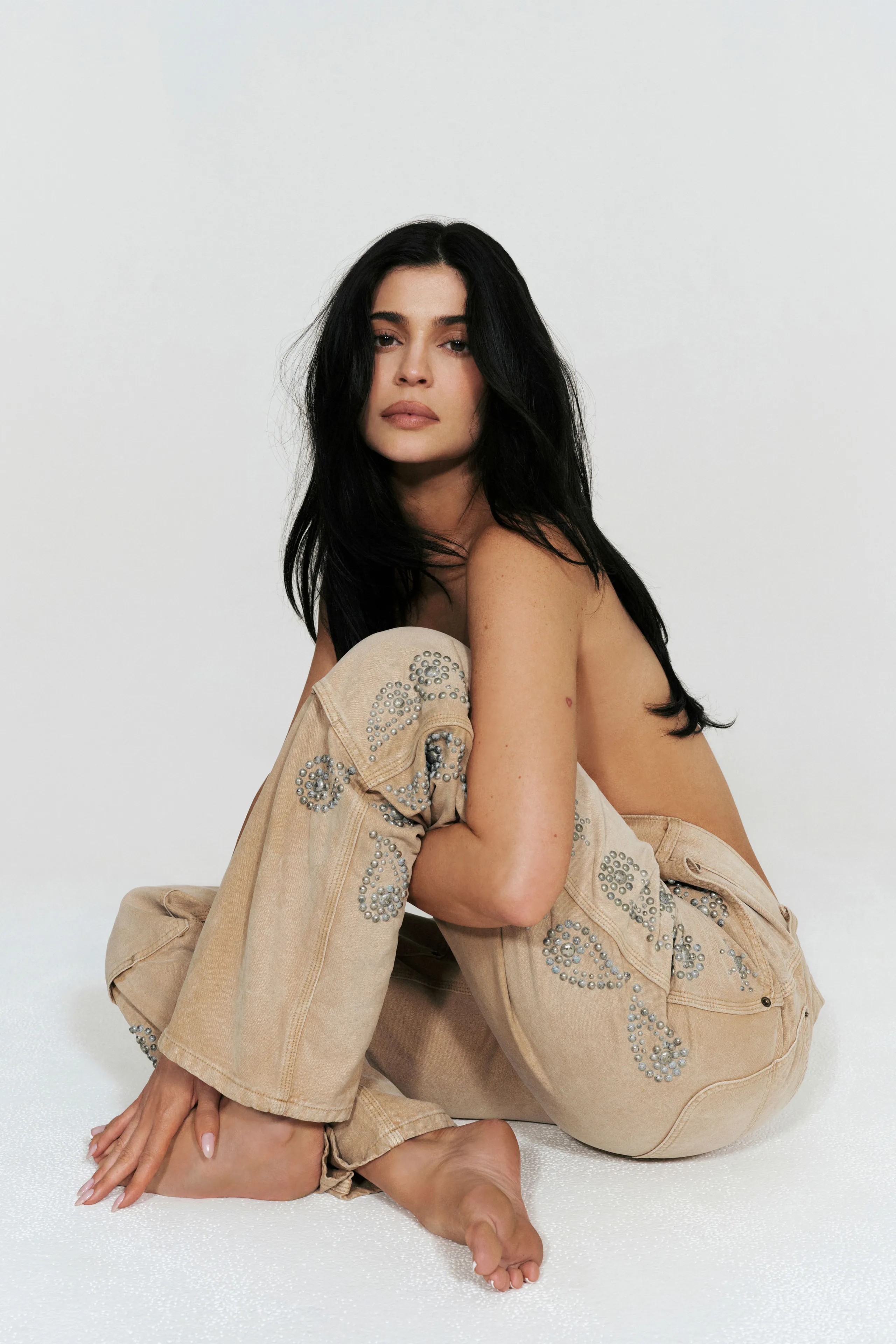 Image may contain Kylie Jenner Black Hair Hair Person Adult Face Head Photography and Portrait