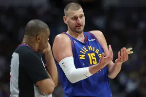 DENVER, COLORADO - APRIL 20: Nikola Jokic #15 of the Denver Nuggets talks to Tony Brothers #25 during a break in play against the Minnesota Timberwolves in the first quarter during Game Two of the First Round of the NBA Western Conference Playoffs at Ball Arena on April 20, 2026 in Denver, Colorado. NOTE TO USER: User expressly acknowledges and agrees that, by downloading and or using this photograph, User is consenting to the terms and conditions of the Getty Images License Agreement. (Photo by Matthew Stockman/Getty Images)