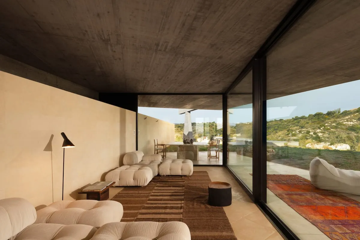 Image may contain Indoors Interior Design Home Decor Architecture Building Furniture Living Room Room and Couch