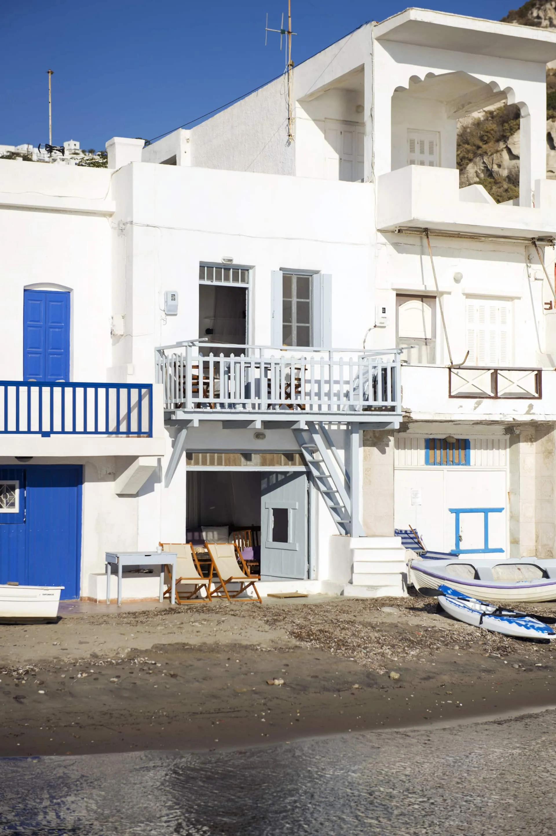 Image may contain Architecture Balcony Building City Boat Transportation Vehicle Urban House Housing and Staircase