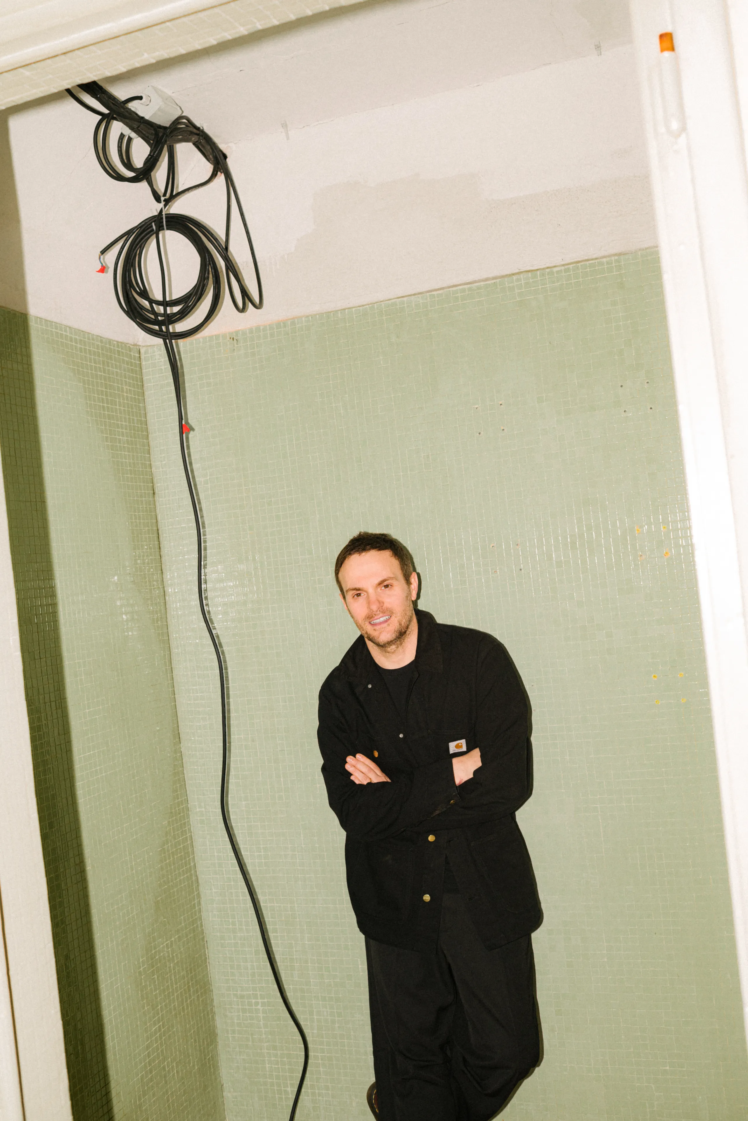 Image may contain Steven Bradbury Adult Person Indoors Interior Design Face Head Photography and Portrait